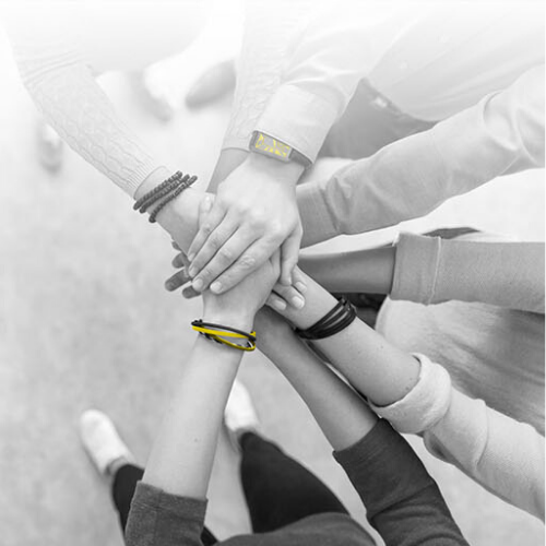 Group of people in huddle