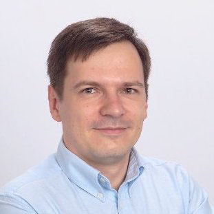 headshot of dmitry larko